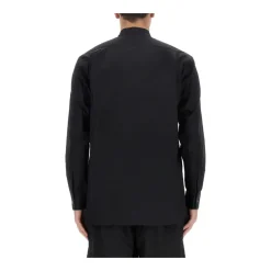 Chemise en coton plissé à franges