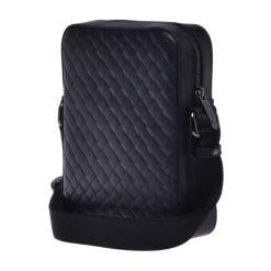 Crossbody bag in black woven print leather