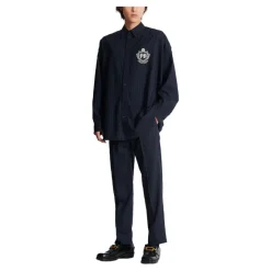 Pantalon droit en laine à rayures