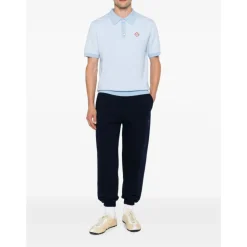 Polo en maille à manches courtes et rayures tennis